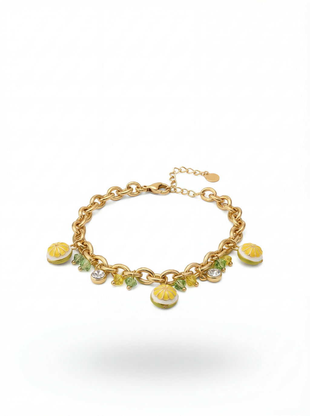 Gold bracelet with lemon charm on a white background