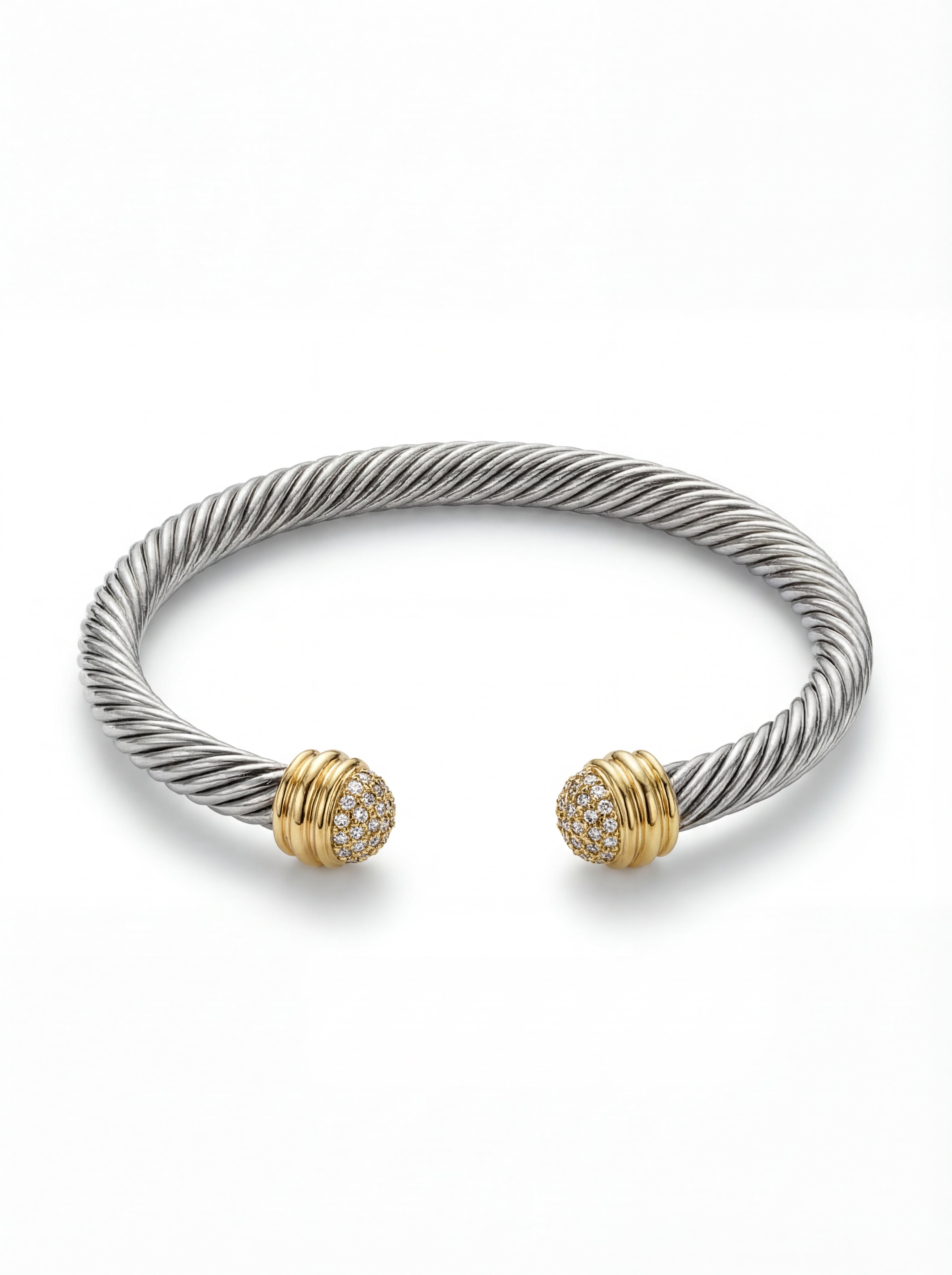 Silver bracelet with gold accents on a white background