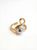 Gold and silver ring on a white background