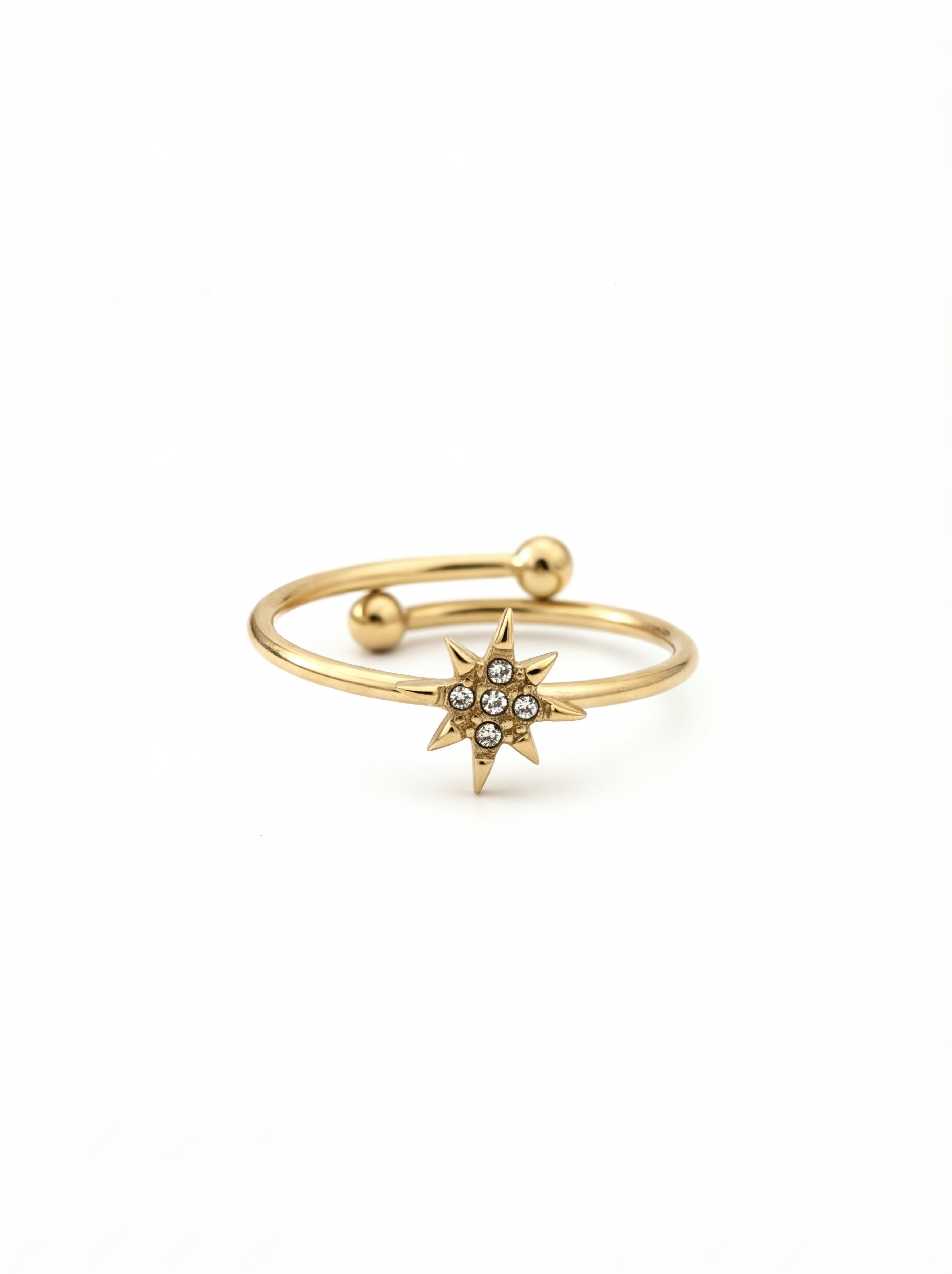 Gold open ring with star-shaped design on a white background