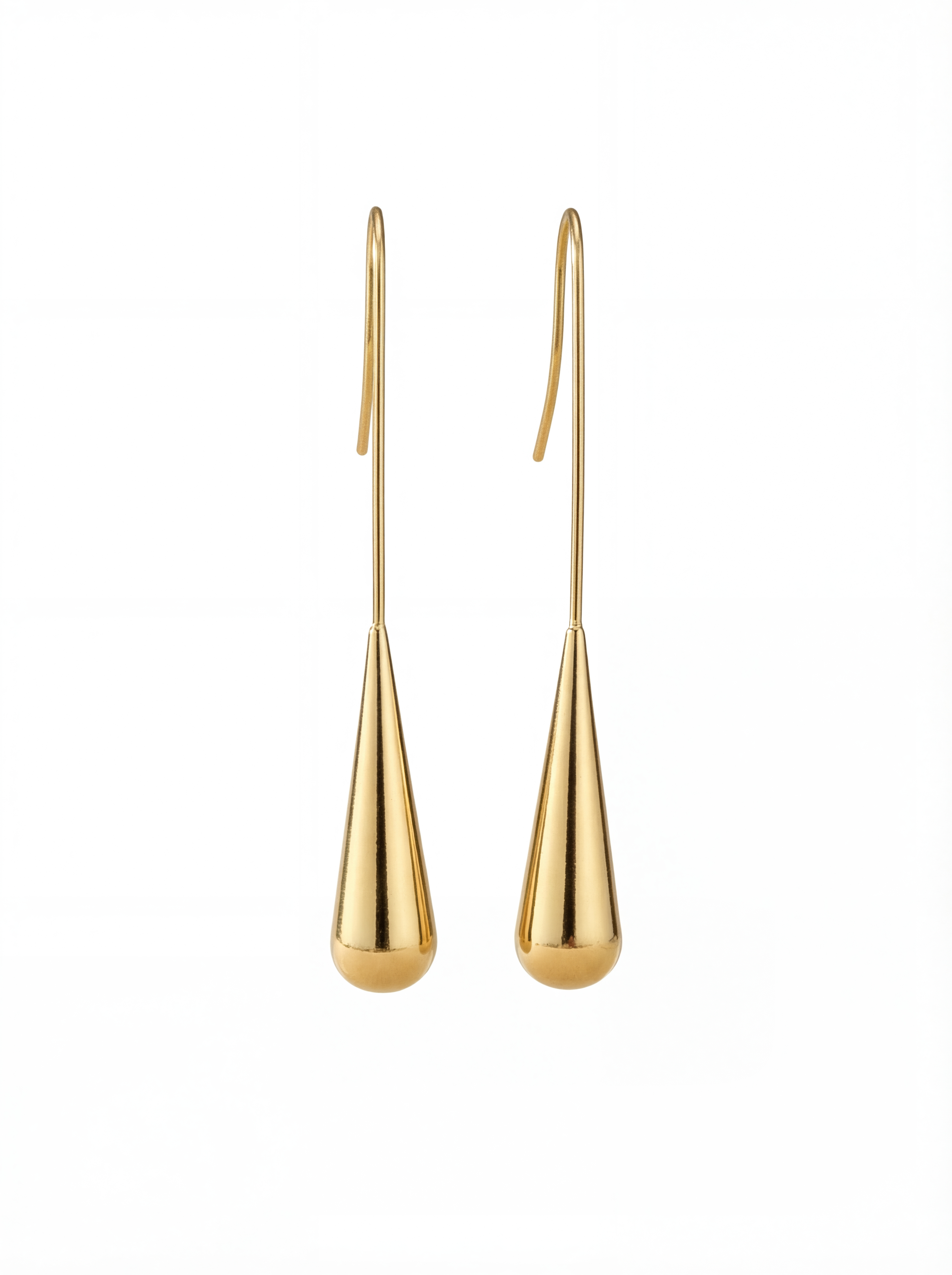Pair of gold drop earrings on a white background