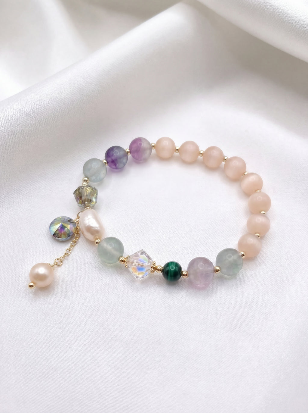 Multicolored beaded bracelet on a white surface