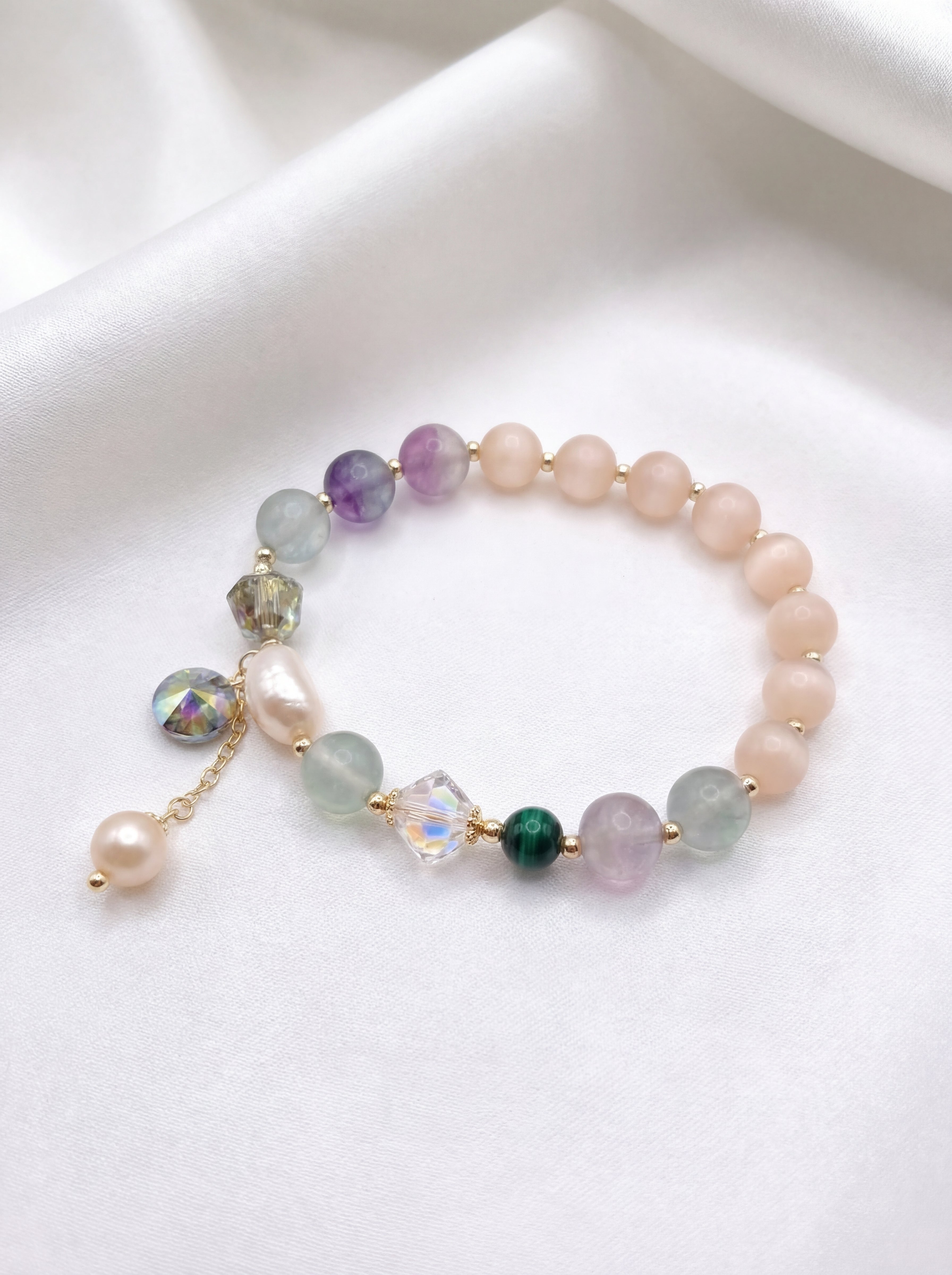 Multicolored beaded bracelet on a white surface