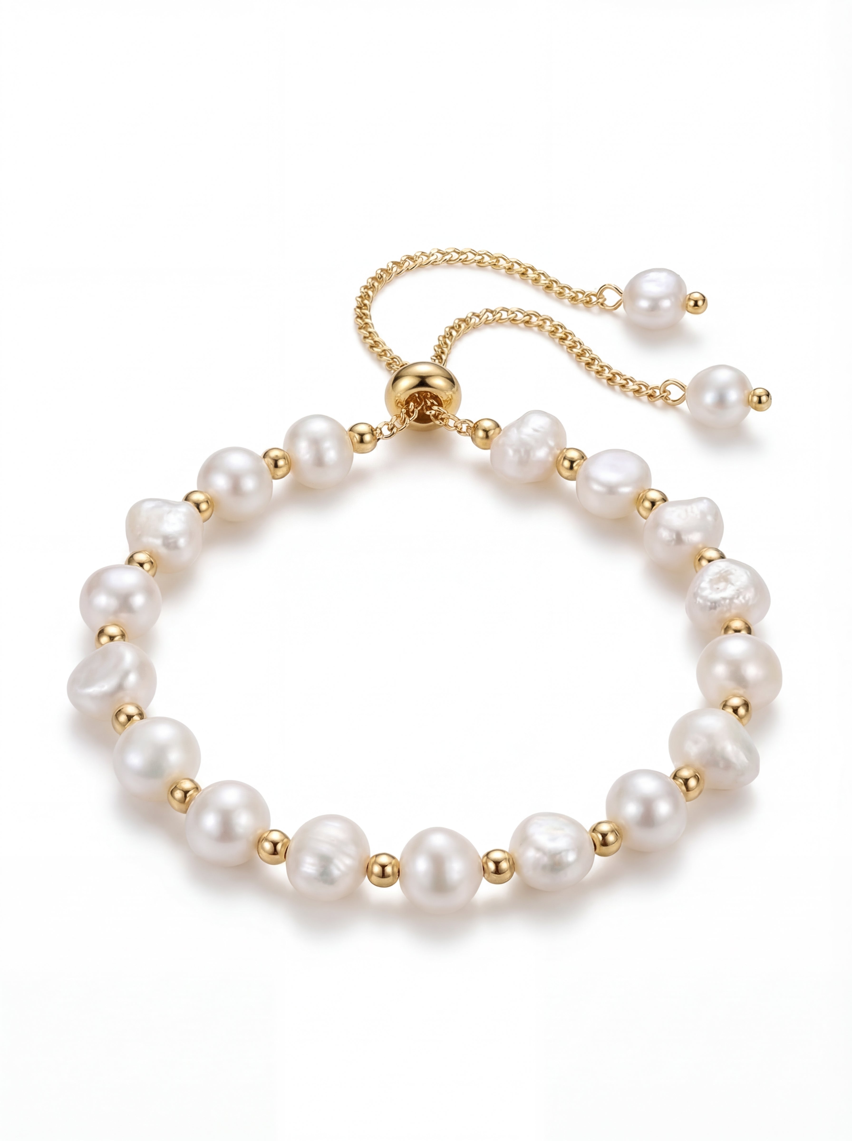 Pearl bracelet with gold accents on a white background